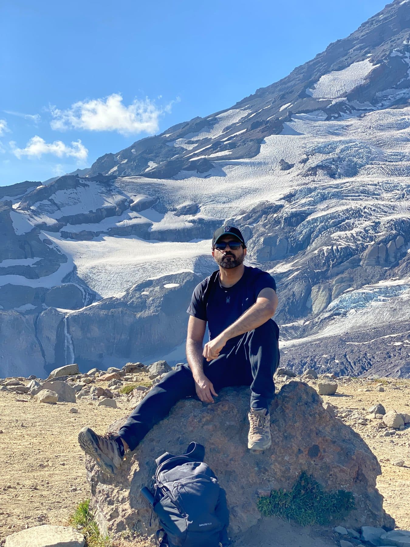 Resting on a boulder below Rainier's glaciers